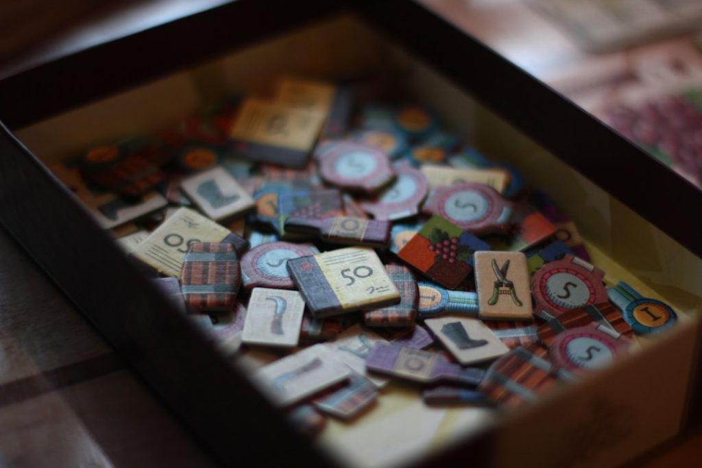 a-box-filled-with-lots-of-wooden-letters-q7zphzrk6k8